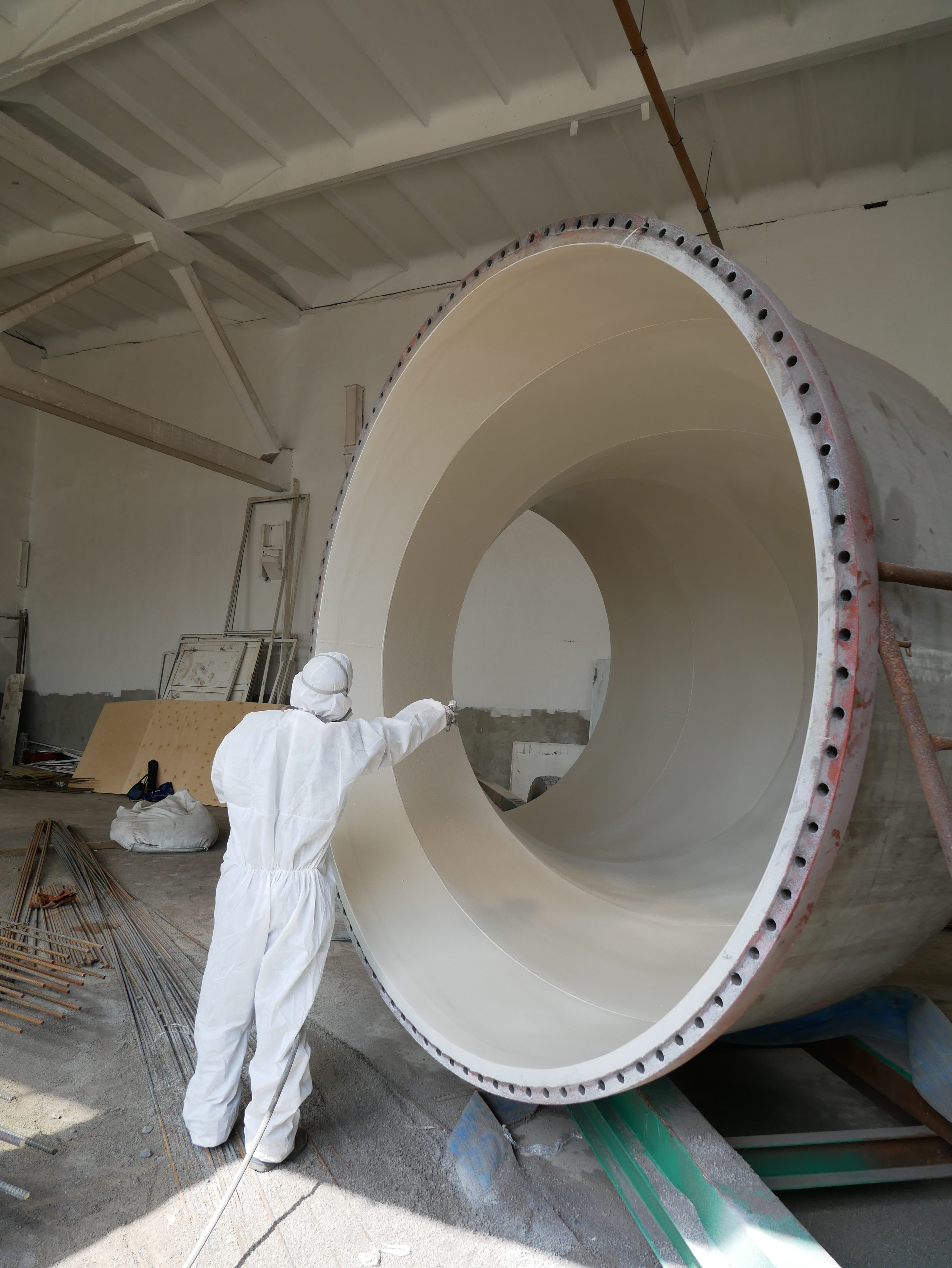 Нанесение покрытия на внутреннюю поверхность отвода